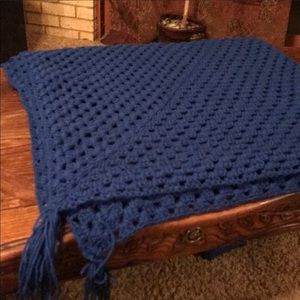 Handmade royal blue throw/afghan with fringe ends.